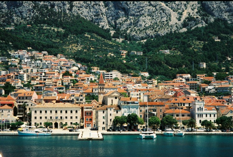 The harbour of a Croatian town at the bottom of a mountain